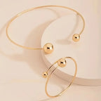 Set van halsketting en armband met bolletjes | Goud