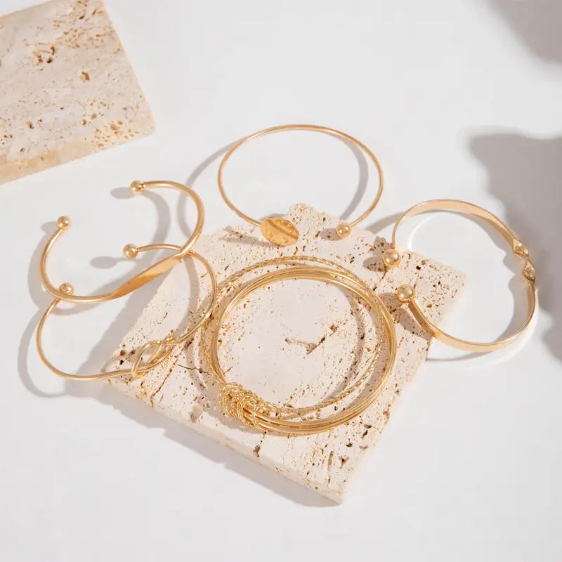 Set Elegante Knoop Armbanden | Goud