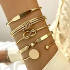 Set elegante knooparmbanden | Goud