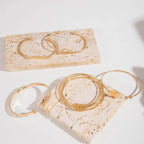 Set elegante knooparmbanden | Goud