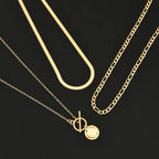 Savira Ketting met gestructureerde munt | Goud