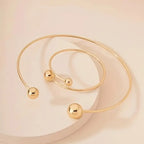 Set van halsketting en armband met bolletjes | Goud