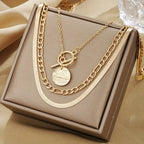 Savira Ketting met gestructureerde munt | Goud