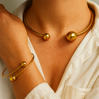 Set van halsketting en armband met bolletjes | Goud