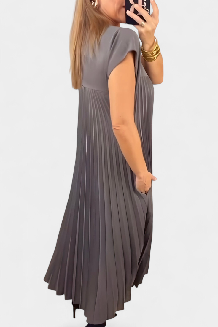 Manuela Mouwloze Jurk met Plooien en Hoge Taille