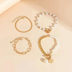 Set van 4 armbanden – Slang, parels & schakels | Goud